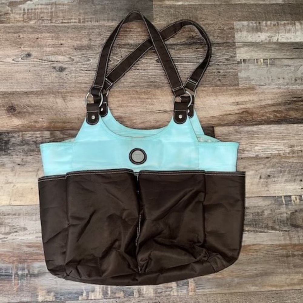 Carter's baby toddler diaper bag. Washable Plastic lined interior. Shoulder tote